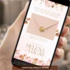 Convite de casamento rosé interativo com envelope digital, flores delicadas e lacre dourado.