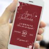 Lembrete digital de casamento marsala exibido na tela de um celular, com fundo vermelho escuro elegante, flores em tons de vinho nos cantos, tipografia cursiva branca com os nomes dos noivos e data do evento destacada.